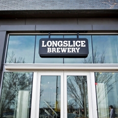 The sign above Longslice Brewery