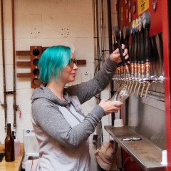 Angie Billson pouring a pint